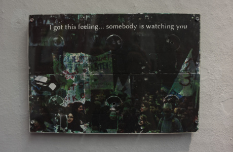 sombody is watchin you - protest image on 3.5" floppy disk