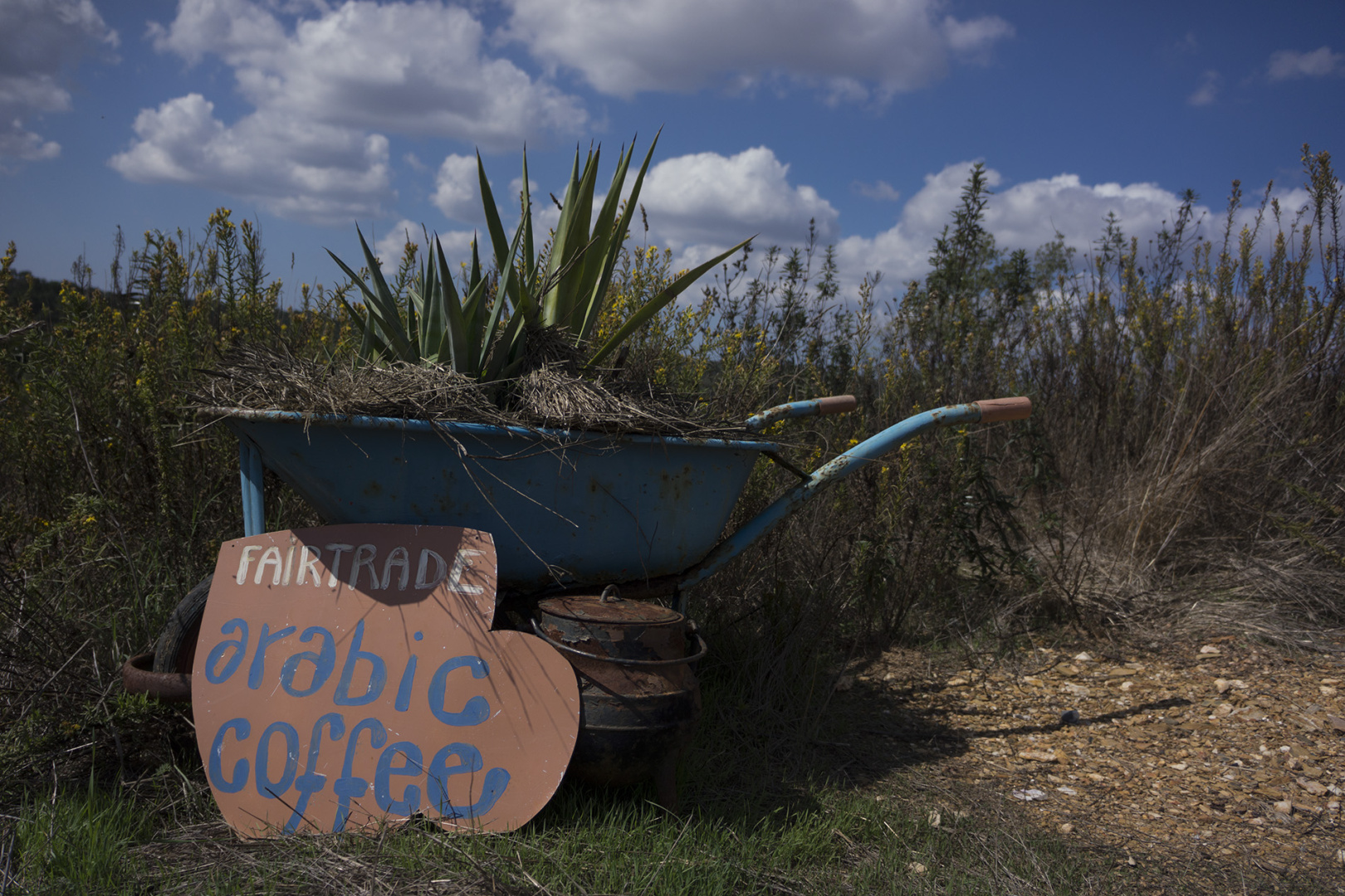 Fairtrade arabic coffee sign at the hills of Tamera, Portugal Fairtrade arabic coffee sign at the hills of Tamera, Portugal