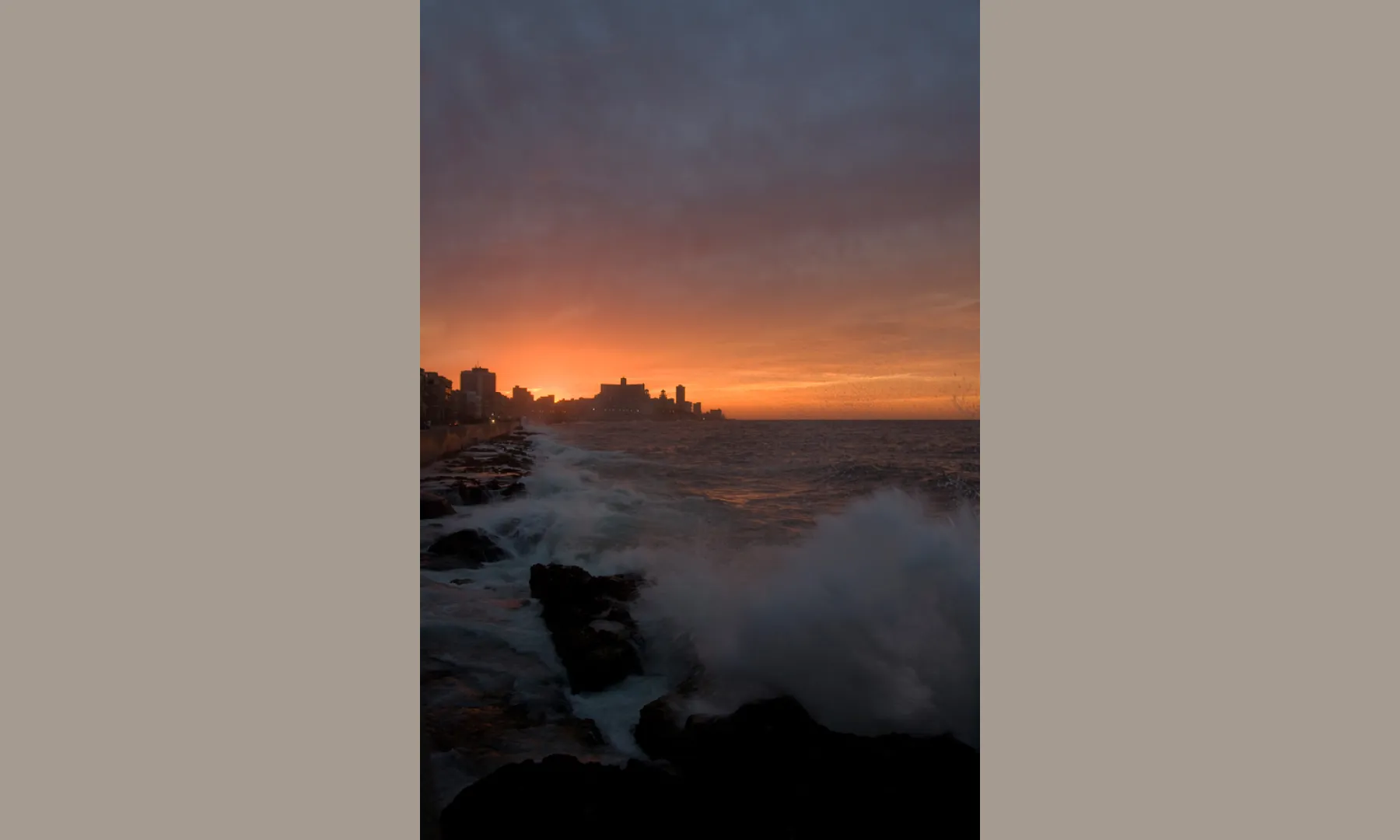 a sun down at the famouse Malecón at Havana / Cuba