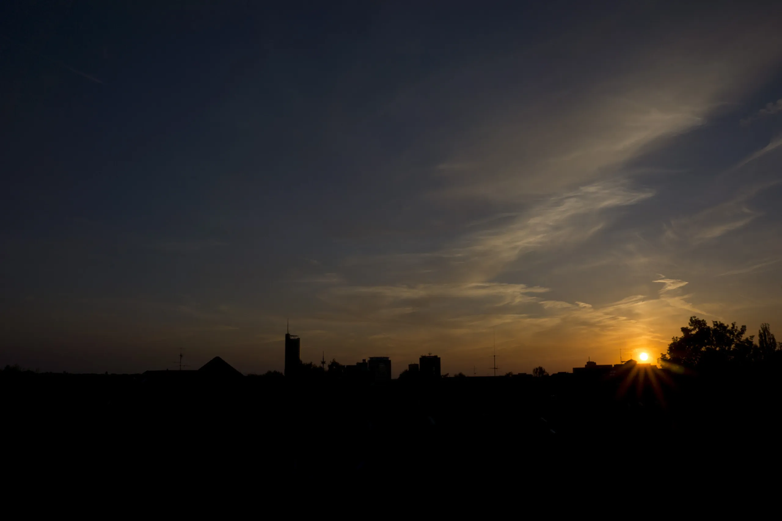 Sundown in Essen showing RWE Tower, Evonic