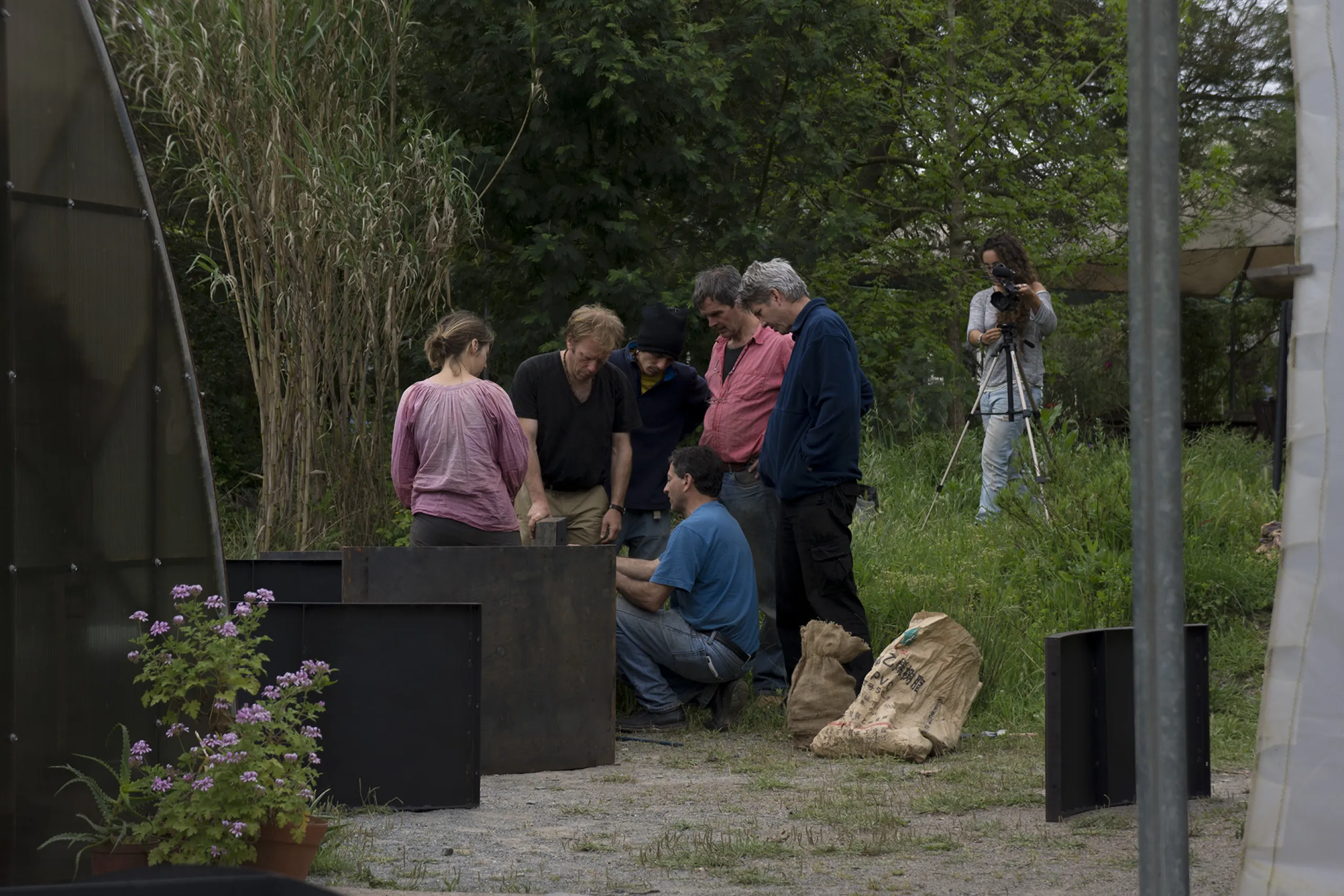 A professor explaining a biogas plant to the audience