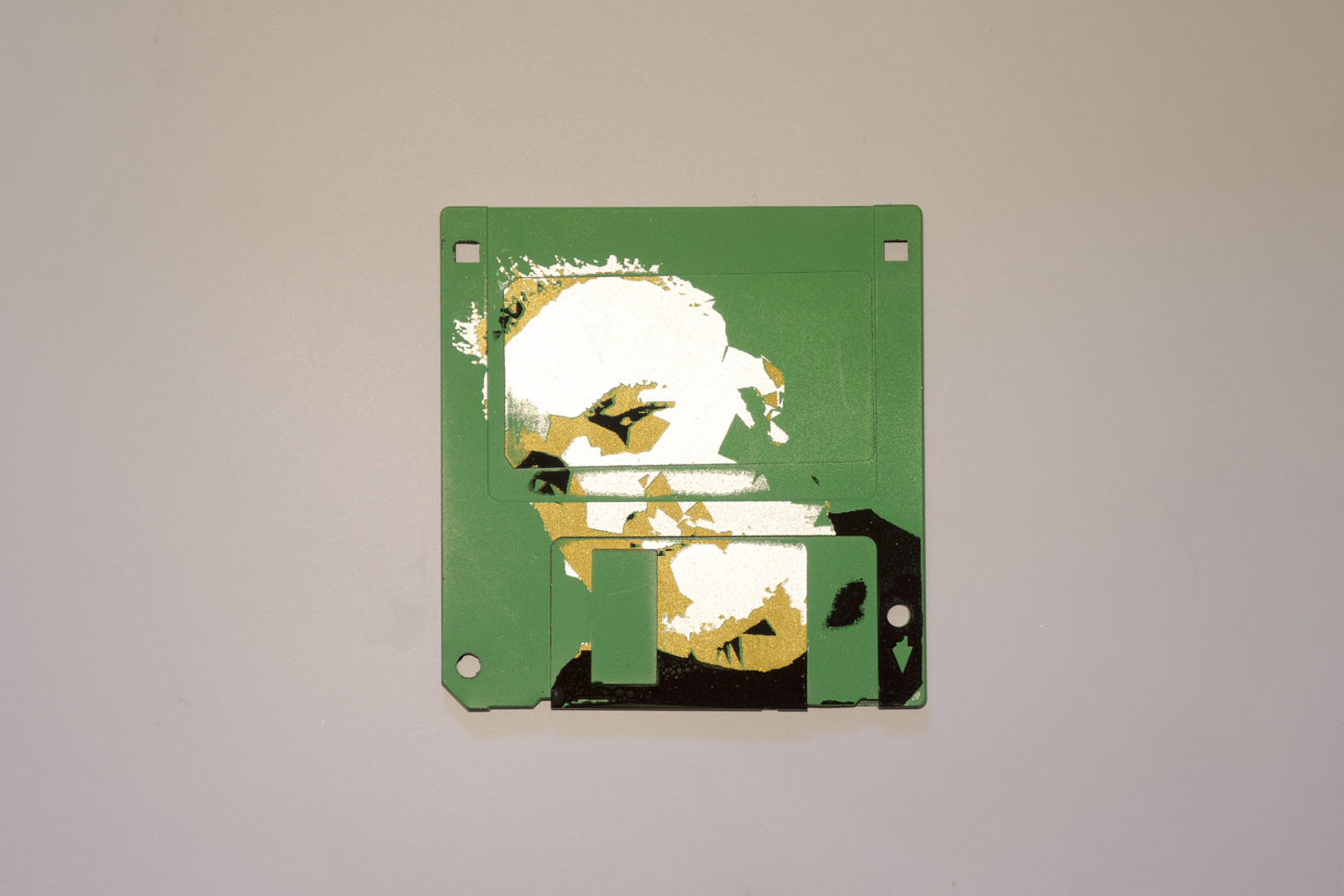 Silkscren of Michi on a 3.5" floppy disk. Contemporary artwork Silkscren of Michi on a 3.5" floppy disk. Contemporary artwork