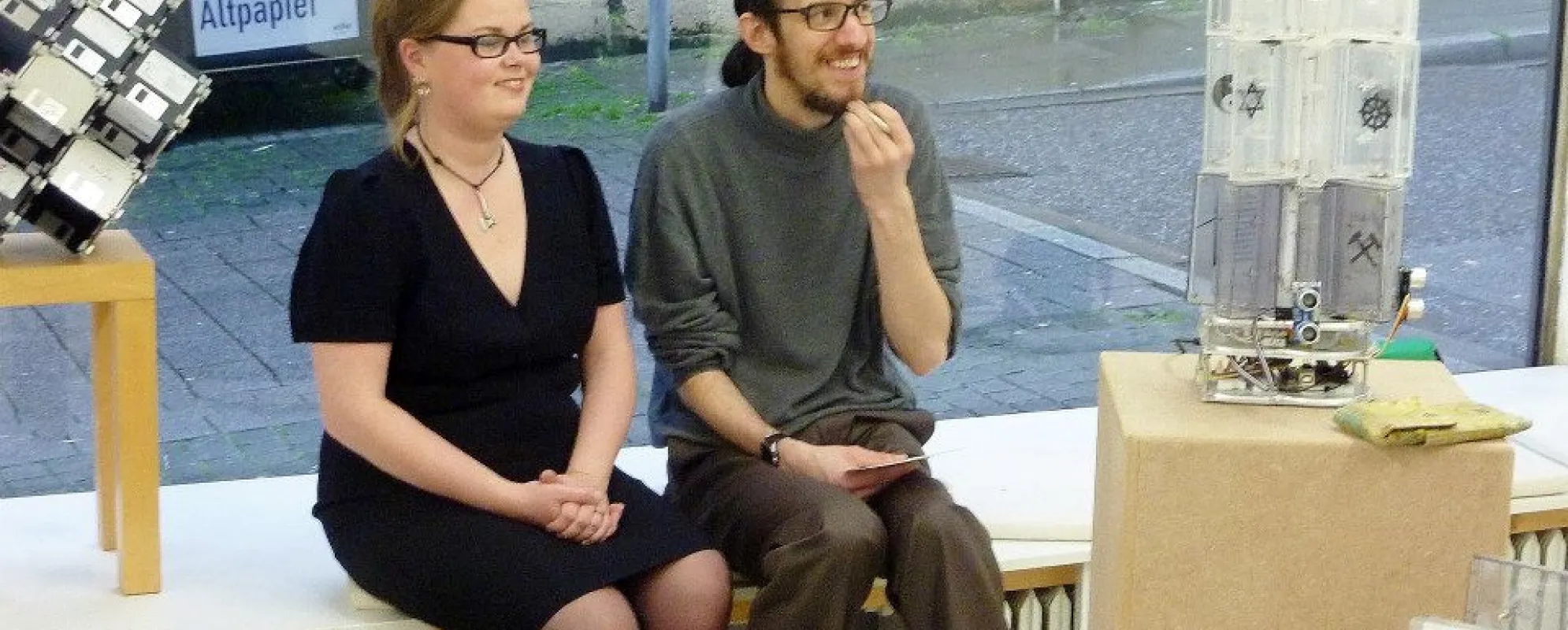Dominik Jais sitting before his interactive art sculpture