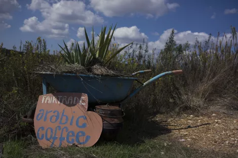 Fairtrade arabic coffee sign at the hills of Tamera, Portugal