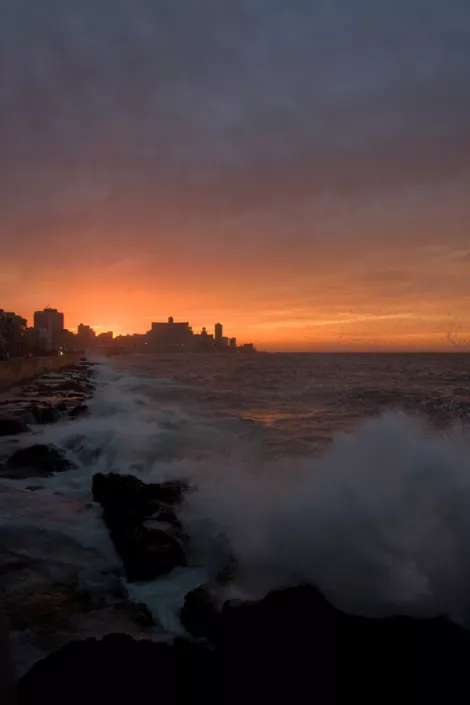 a sun down at the famouse Malecón at Havana / Cuba