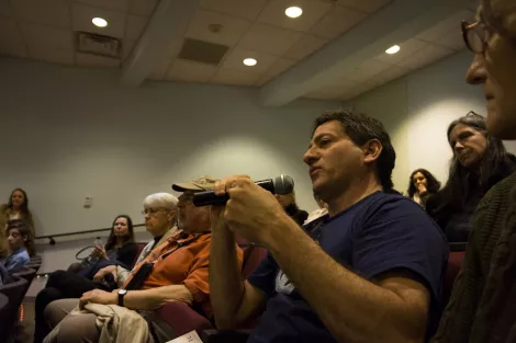 A professor is asking question during a public viewing and discussion session in Ossining, New York, USA