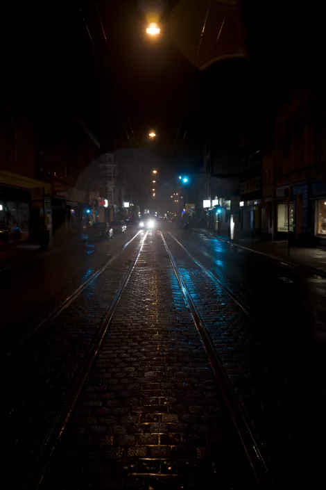 Waiting for the bus in a cold dark morning