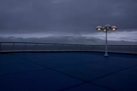 The stern of a ferry after sundown The stern of a ferry after sundown