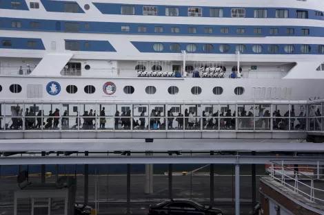 Passengers leaving the ferry at Helsinki, Finland Passengers leaving the ferry at Helsinki, Finland