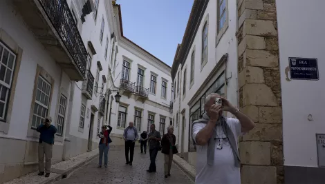 People at the old city of Faro, Portugal