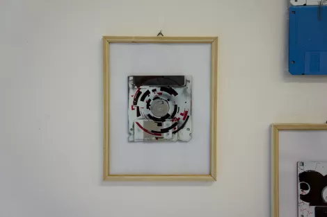 the circles, a silk screen on 3.5" floppy disks art